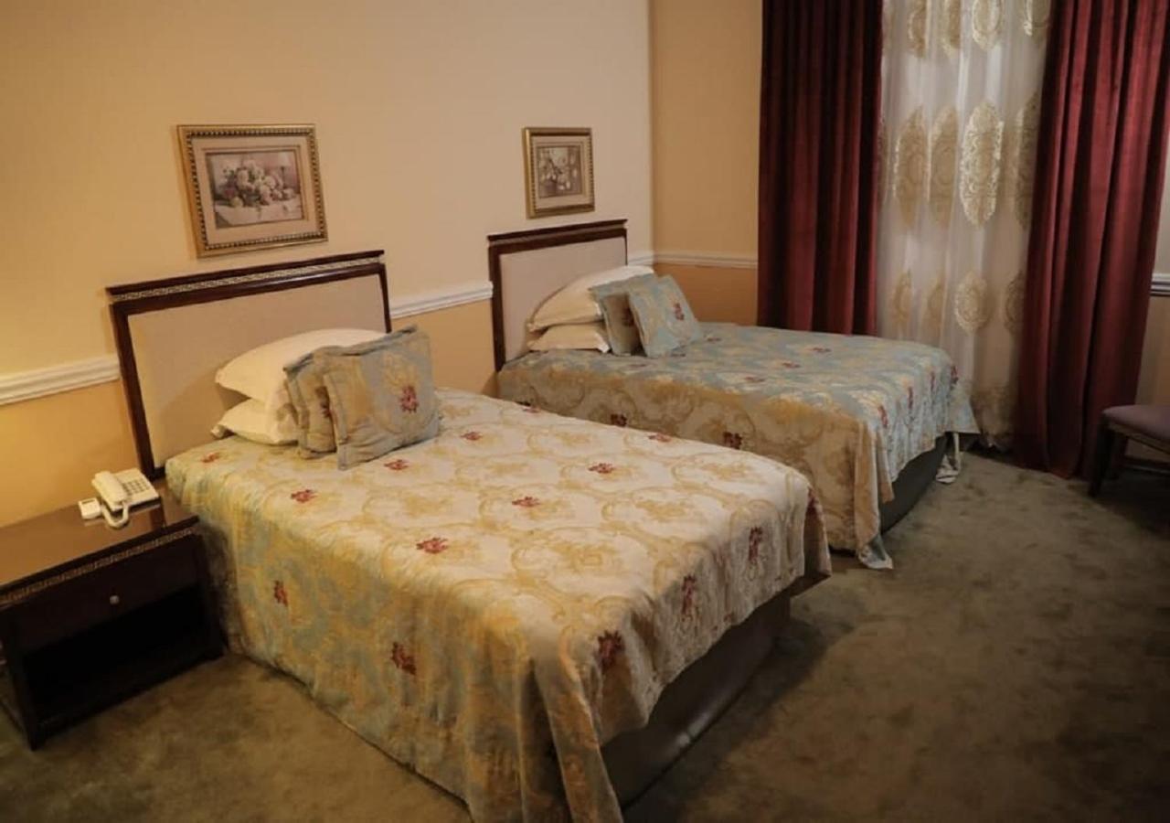Hotel Bek Tachkent Extérieur photo
